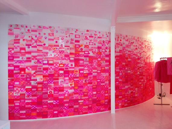the wall is complete after 40 hours, 1,215 postcards, 2,430 nails, and many helping hands