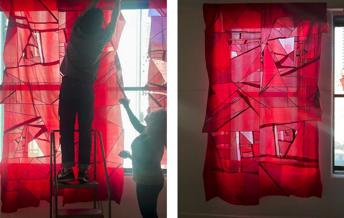 Tommy and Amanda putting unfinished patched panel against the window