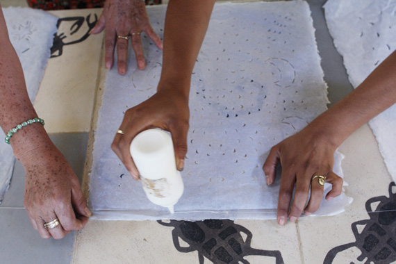 gluing thread to string papeles together
