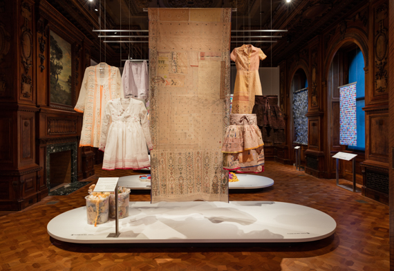 dosa's 1st generation jamdani pieces, jamdani scraps, 2nd generation recycled textile panel, and garments made from recycled textile panels | photo by Matt Flynn © Smithsonian Institution