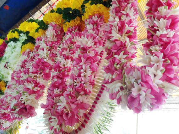 garlands of hibiscus, jasmine, marigold