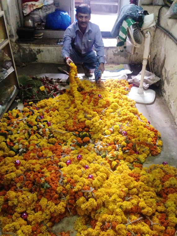 temple flowers carpet the floor at Adiv