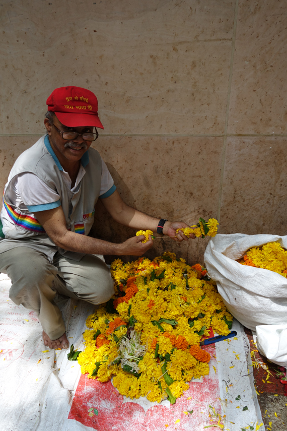 Vinod sorts offerings at the temple