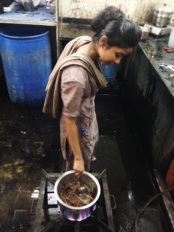 coconut husk dye bath is stirred 40 minutes in preparation for solid colors